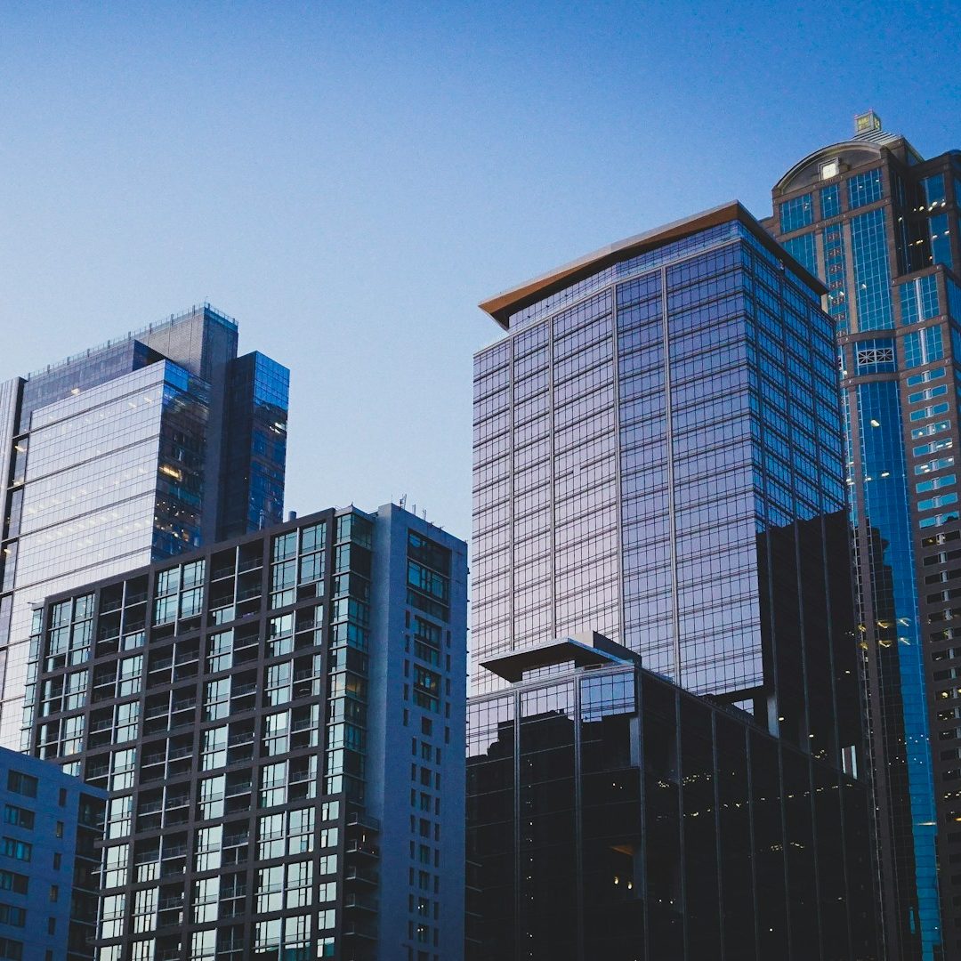 Skyscraper Skyscrapers under a clear blue sky, showcasing modern architectural design.